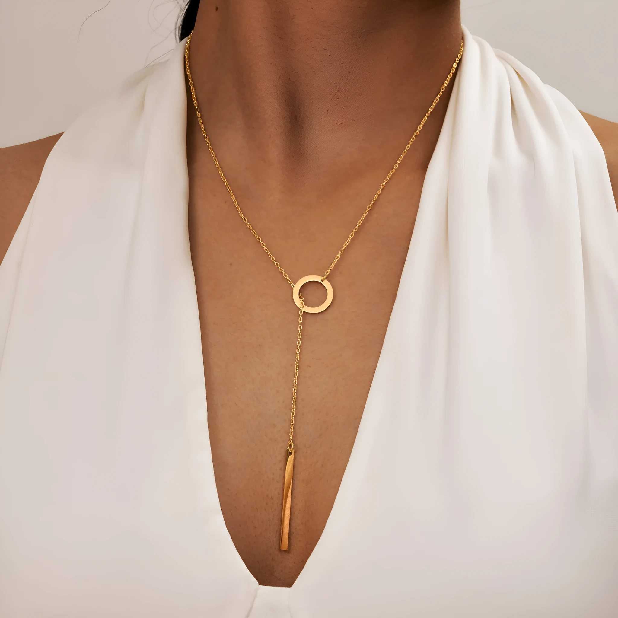 Gold electroplated stainless steel cross and ring geometric pendant necklace on O-link chain