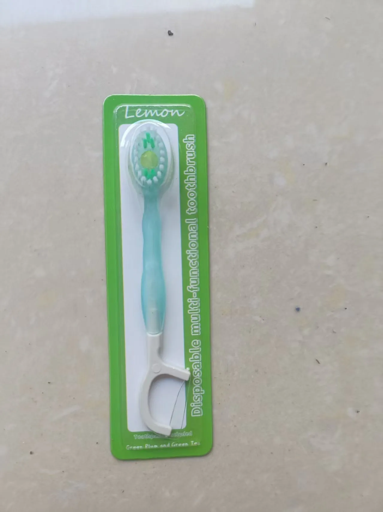 Exploding bead disposable mini toothbrush with toothpaste beads in four flavours for travel