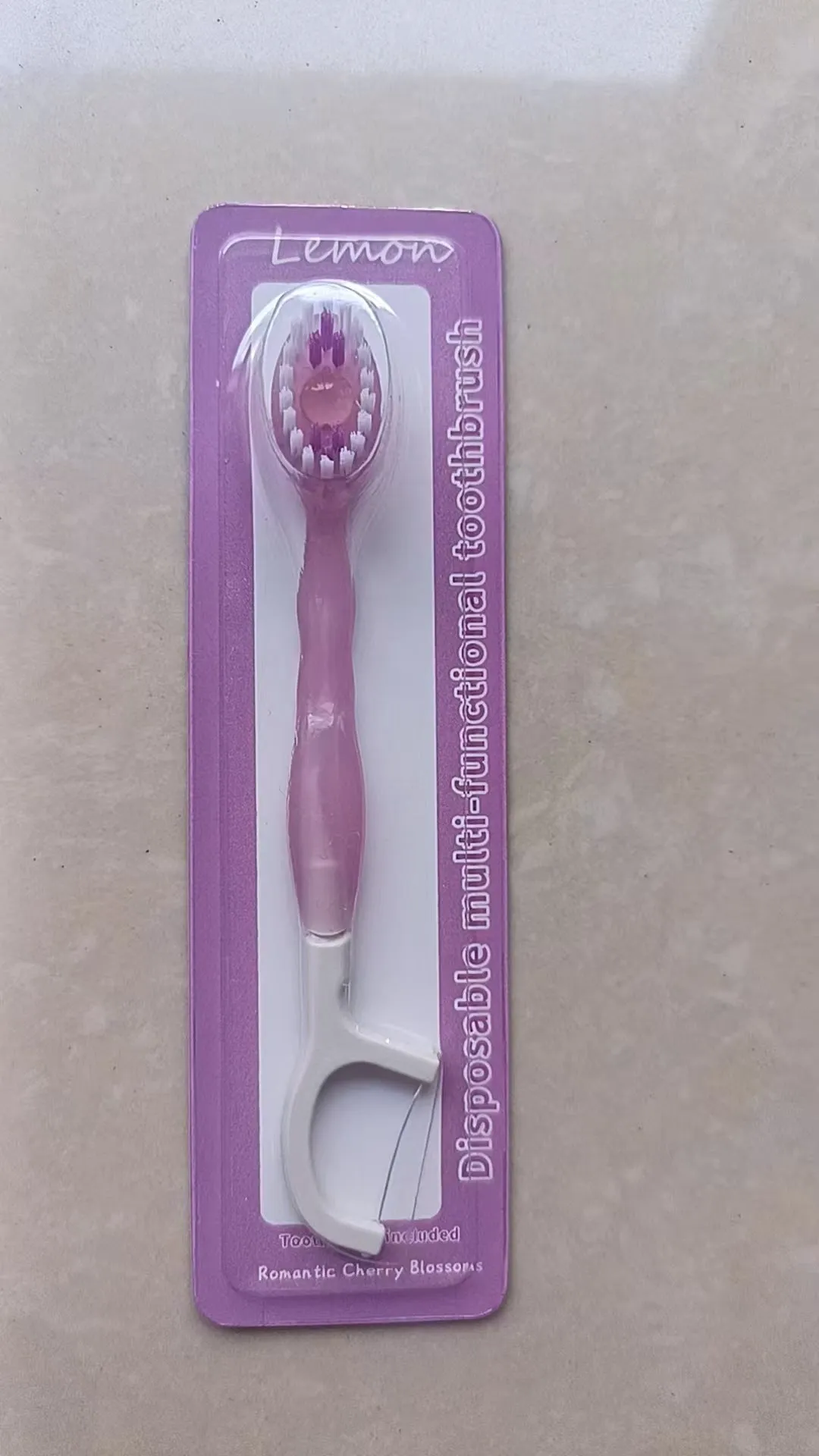 Exploding bead disposable mini toothbrush with toothpaste beads in four flavours for travel