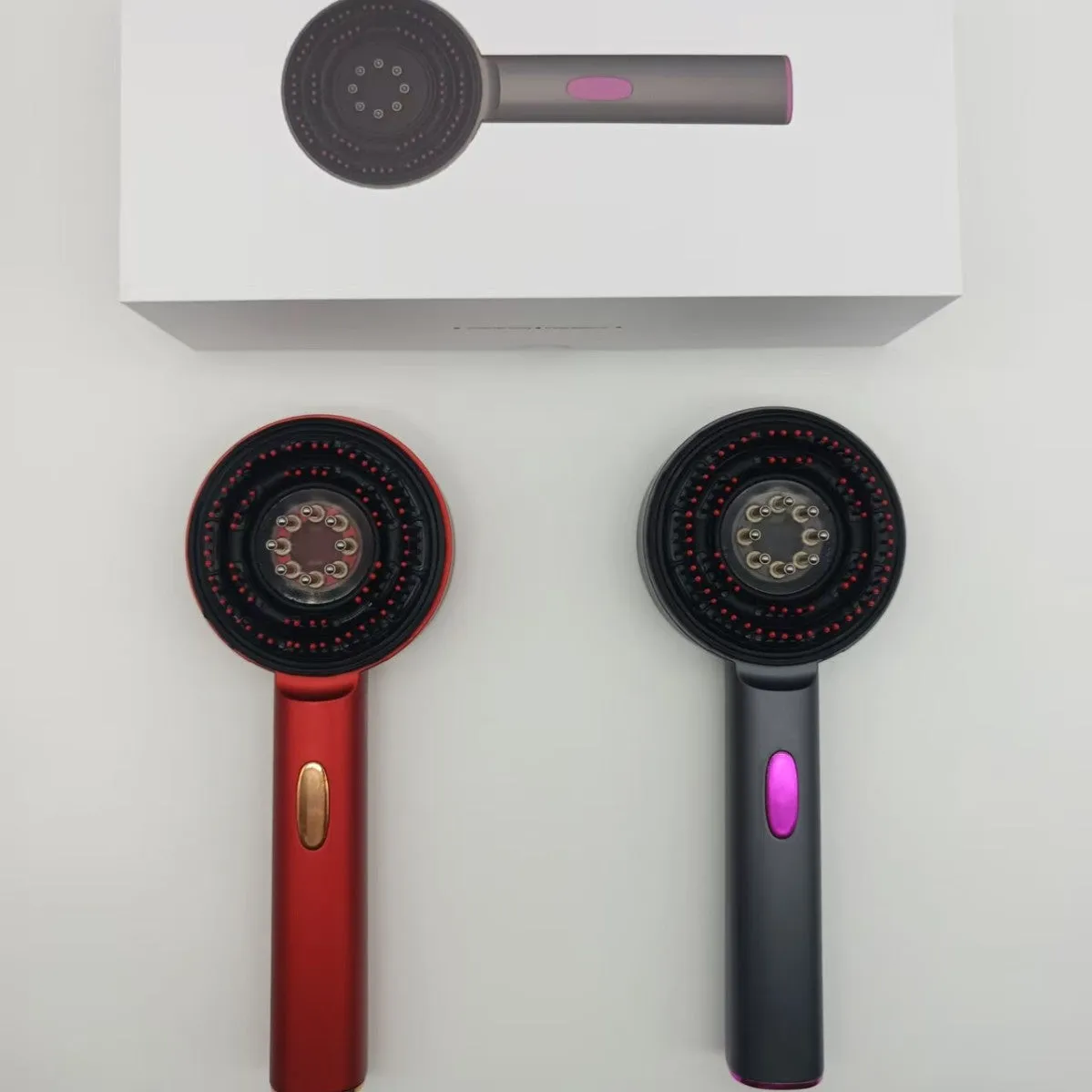 Electric scalp comb with red light and massage function in gray colour for home hair care use