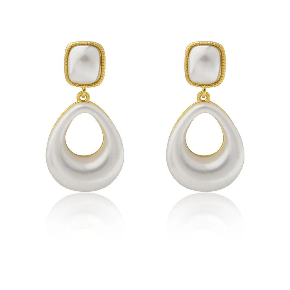 Gold coloured drop shaped earrings with a central imitation pearl, shown on a white background.