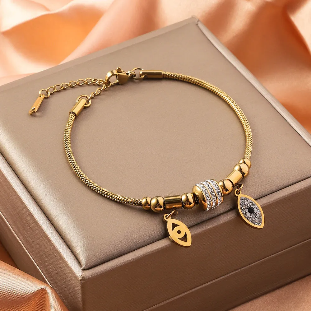 Titanium steel bracelet with electroplated colour and an inlaid shell design, showing pattern options like a five-pointed star.
