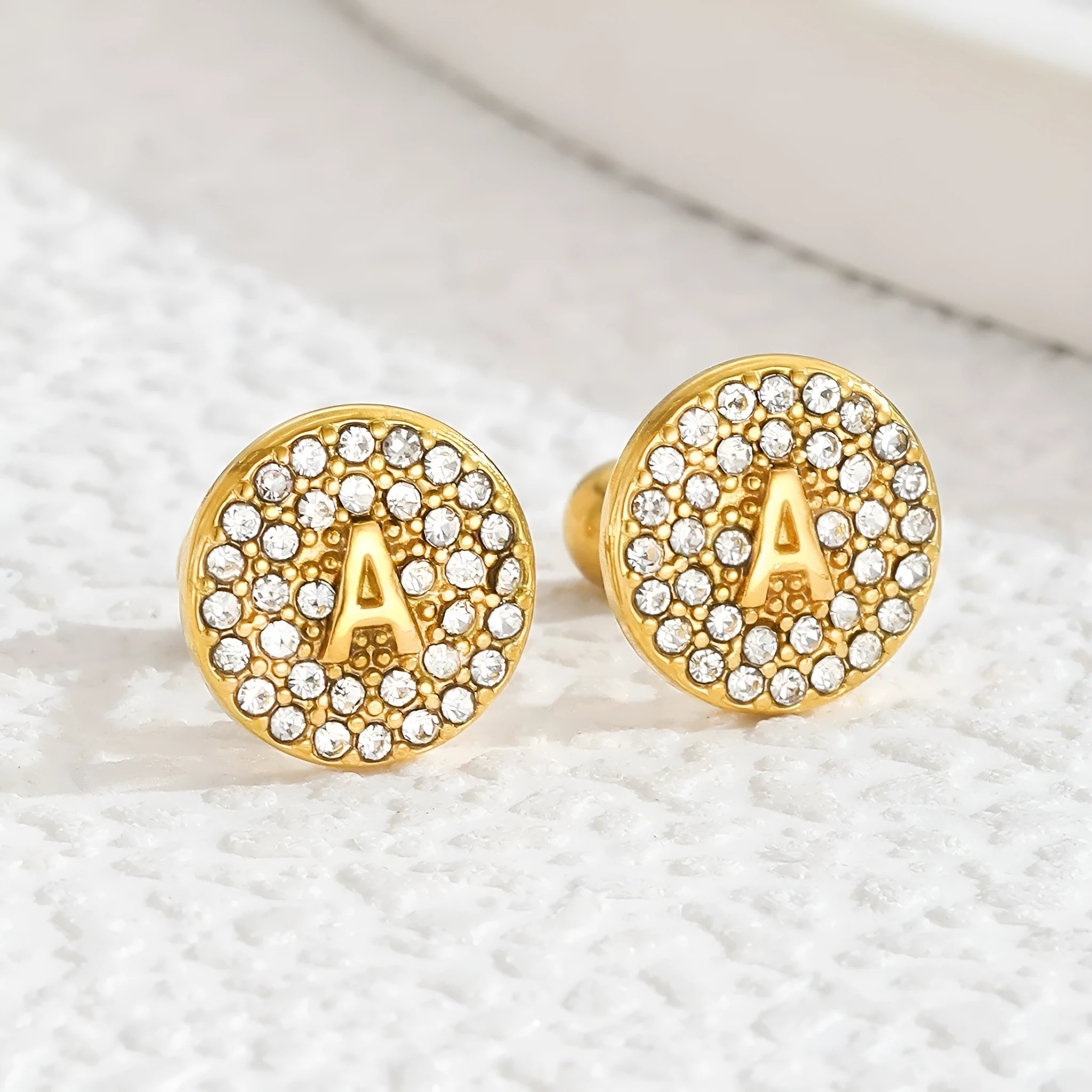 Round micro inlaid zircon stainless steel stud earring with real gold plating, English letter A on a unisex college style earring