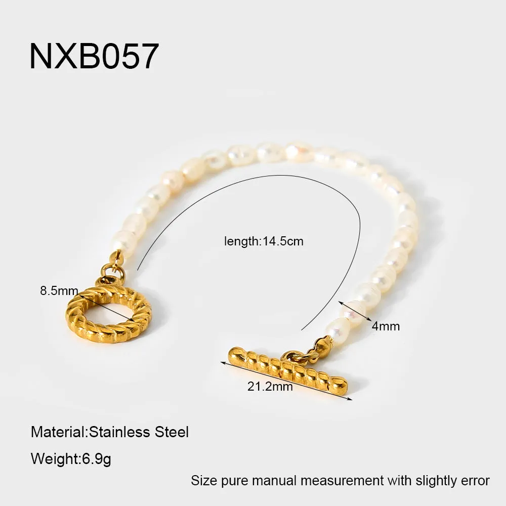 Women's freshwater pearl and geometric stainless steel necklace and bracelet set on a grey background