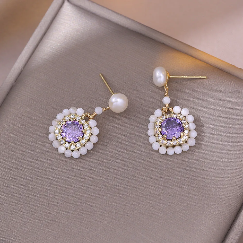 Natural freshwater pearl flower-shaped earrings in purple with diamond treatment finish