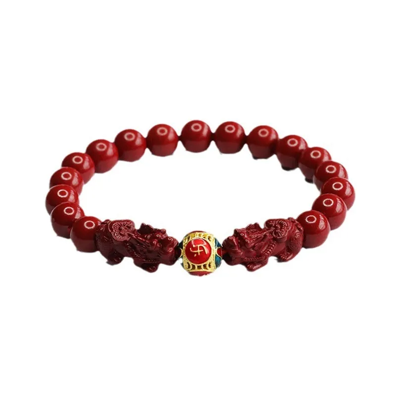 Close-up of a purple gold sand Cinnabar bracelet with carved Double Pixiu design, bead size 8mm.