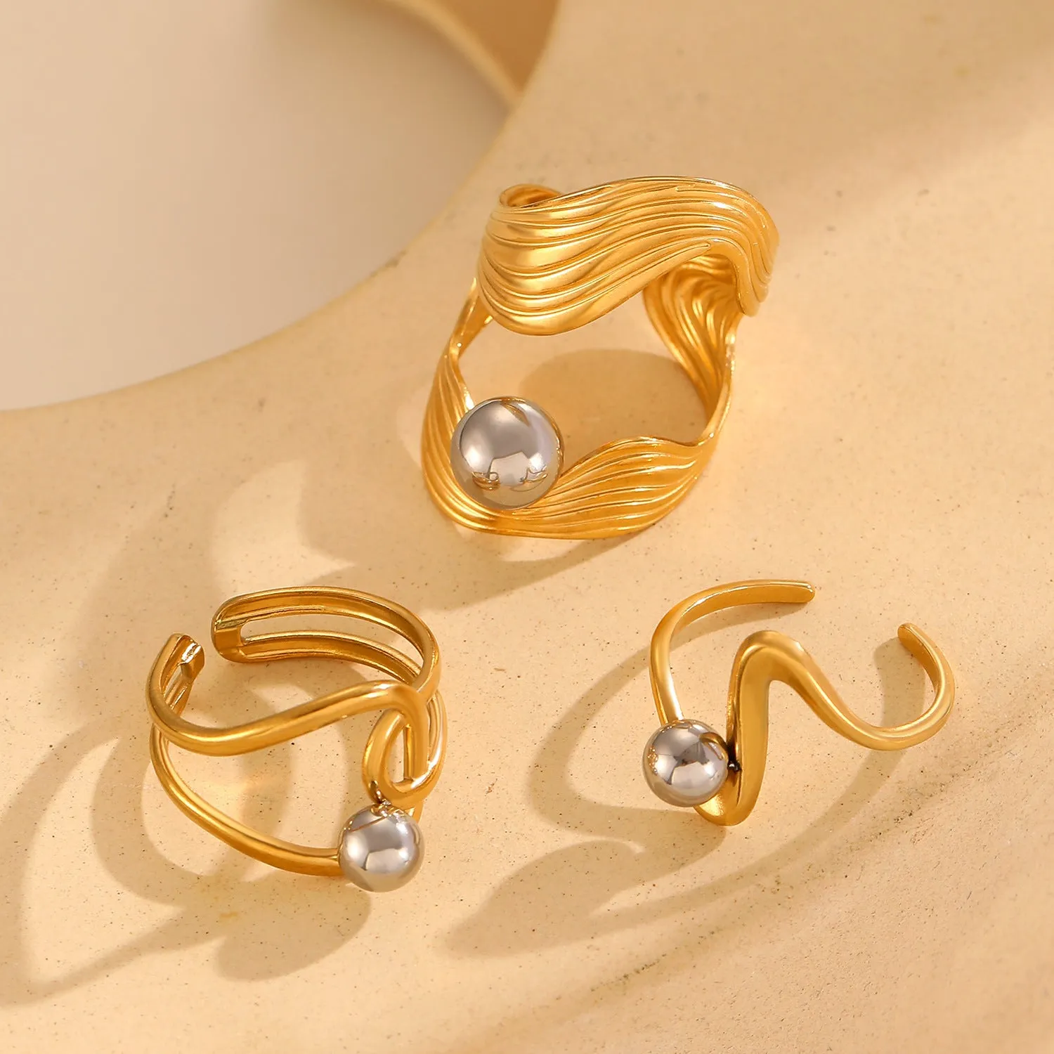 Geometric hollow line open ring in 304 stainless steel with 18K real gold finish, ellipse design