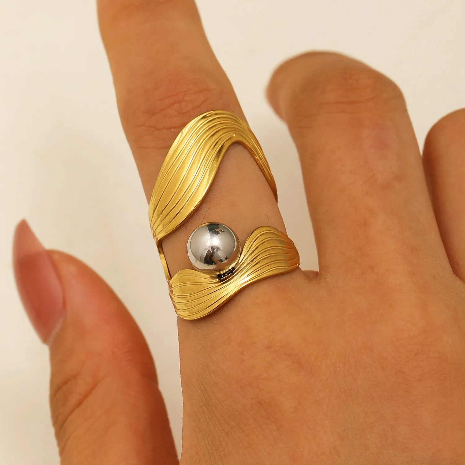 Geometric hollow line open ring in 304 stainless steel with 18K real gold finish, ellipse design