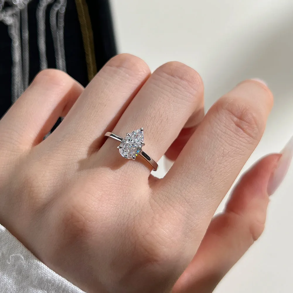 Sterling silver ring with pear-shaped high-grade zircon inlay, closed band, electroplated finish, multiple colours available