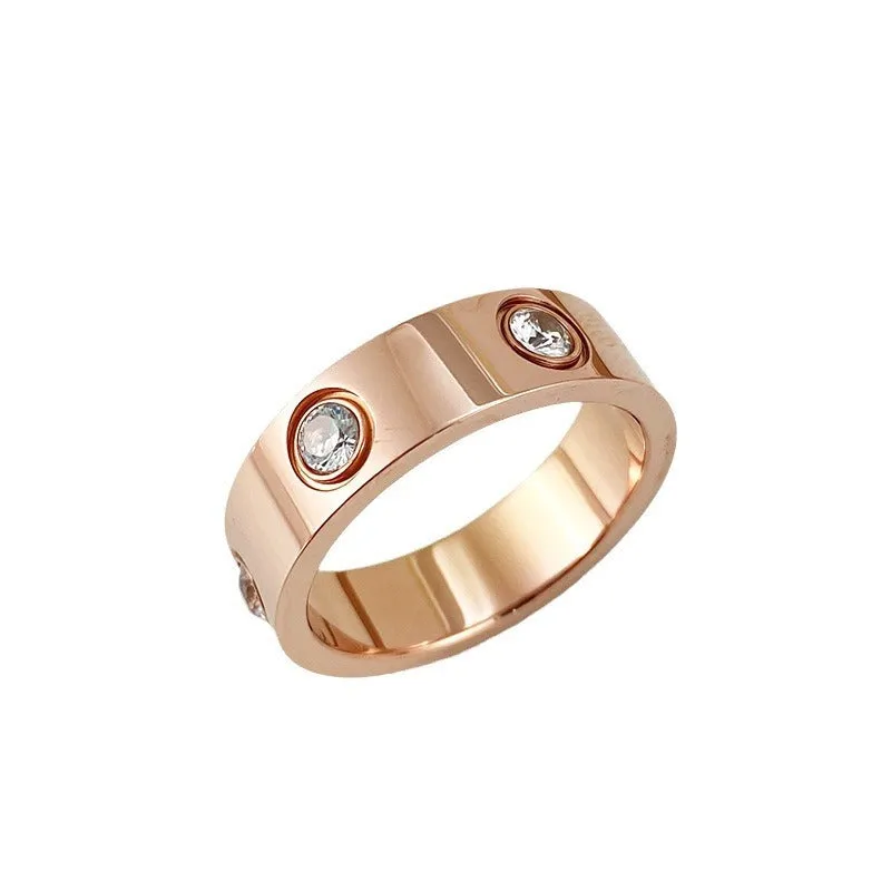 Titanium steel rhinestone couple ring in rose gold 5MM width on white background