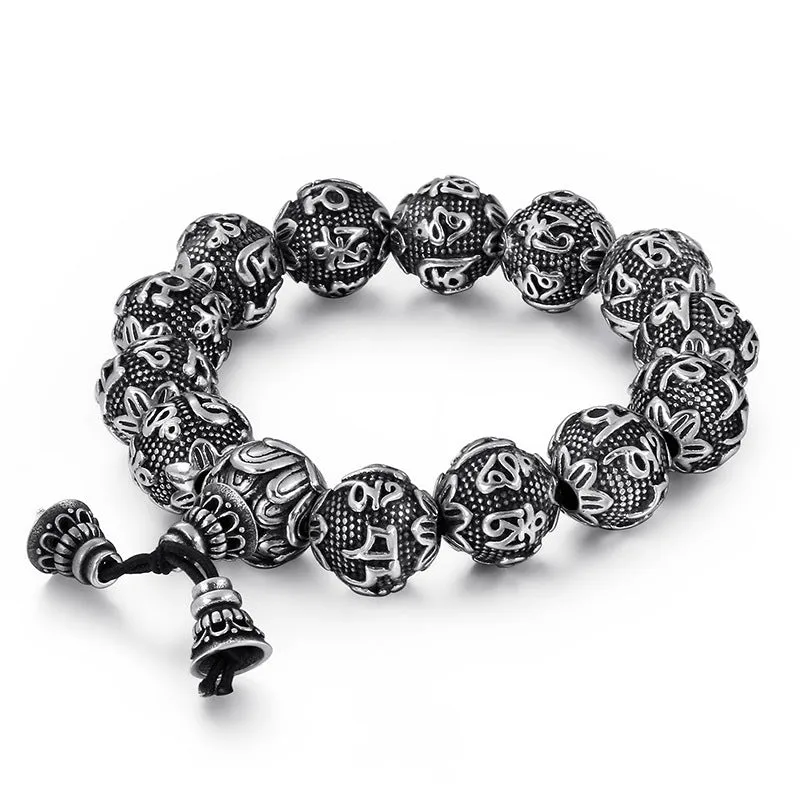 Titanium steel cast unisex bracelet with engraved text in 13mm width on plain background
