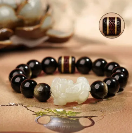 Natural Rainbow Eye Obsidian bracelet with crystal and stone beads in gold or jade colours.