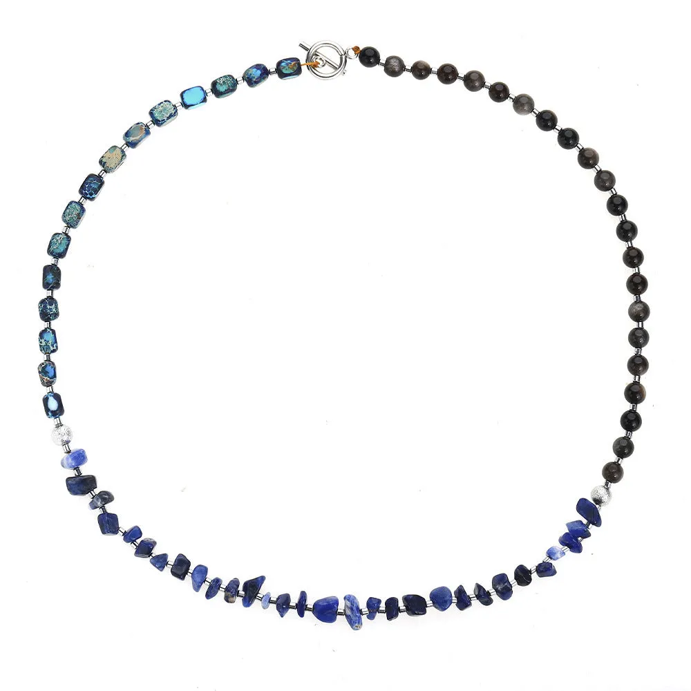 Blue hand-woven bracelet made from crushed Fang Hui stone and gold obsidian with geometric shapes
