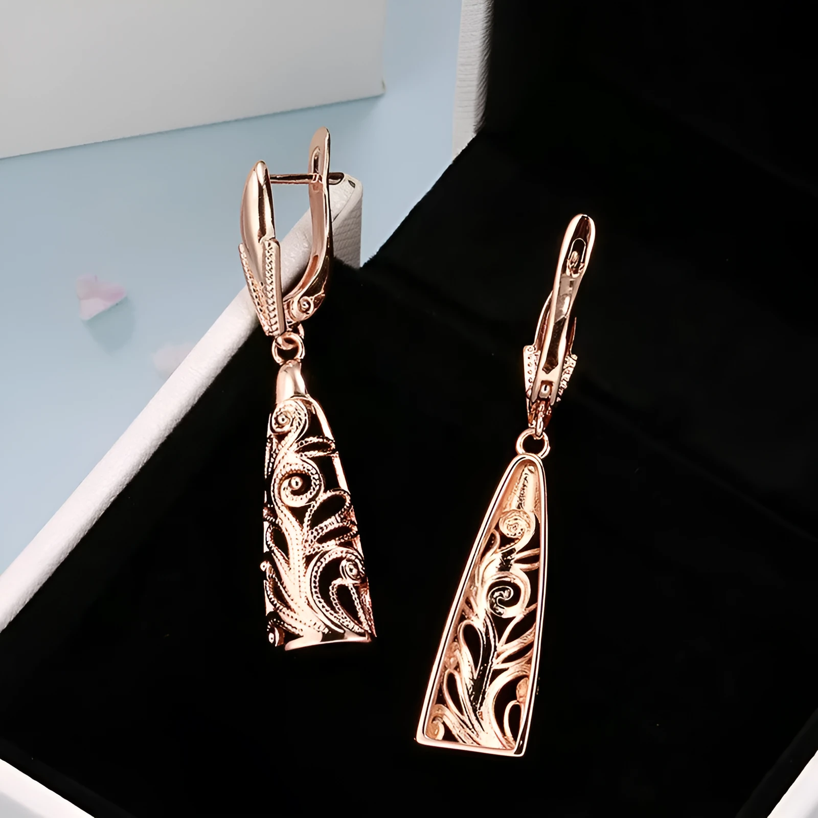 Copper retro hollow-carved leaf earrings in rose gold for women