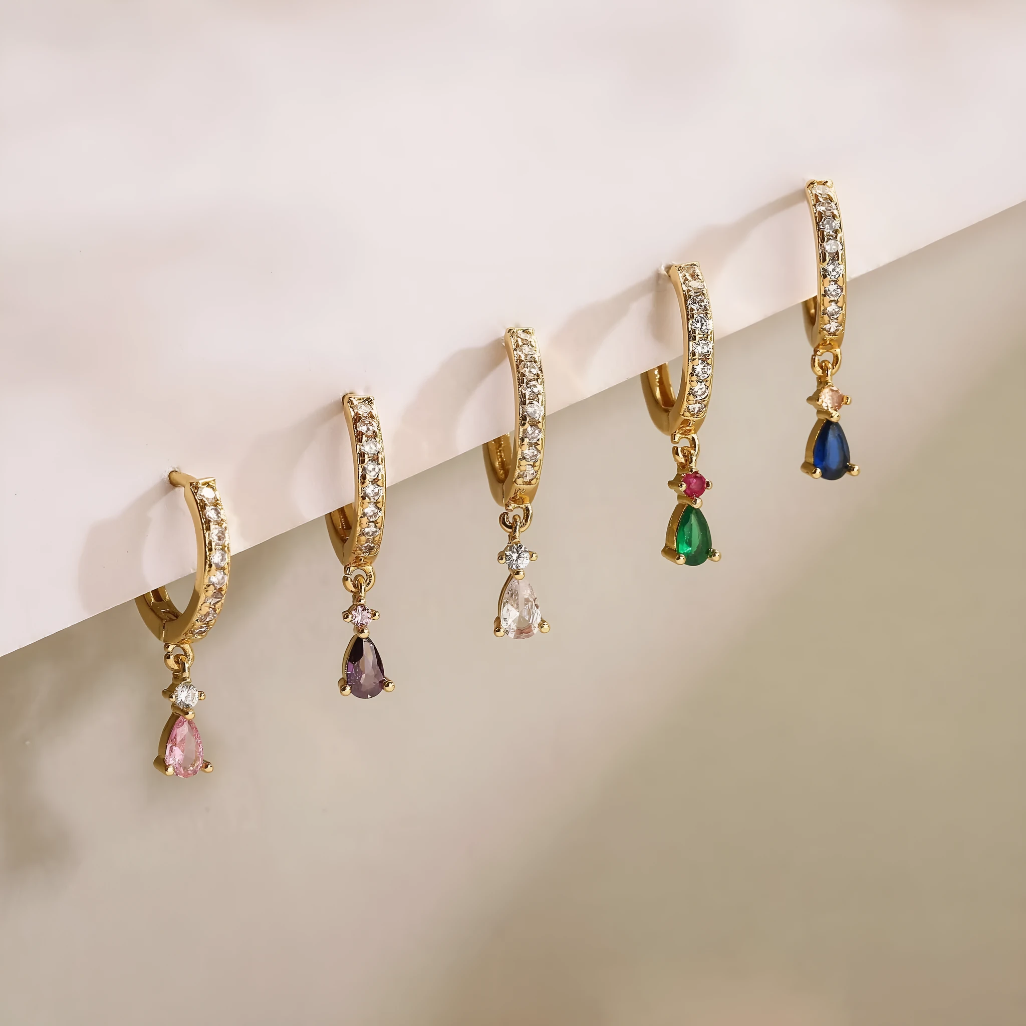 Women's geometric copper earrings with micro-inlaid colourful crystals in water drop shape, gold-plated finish