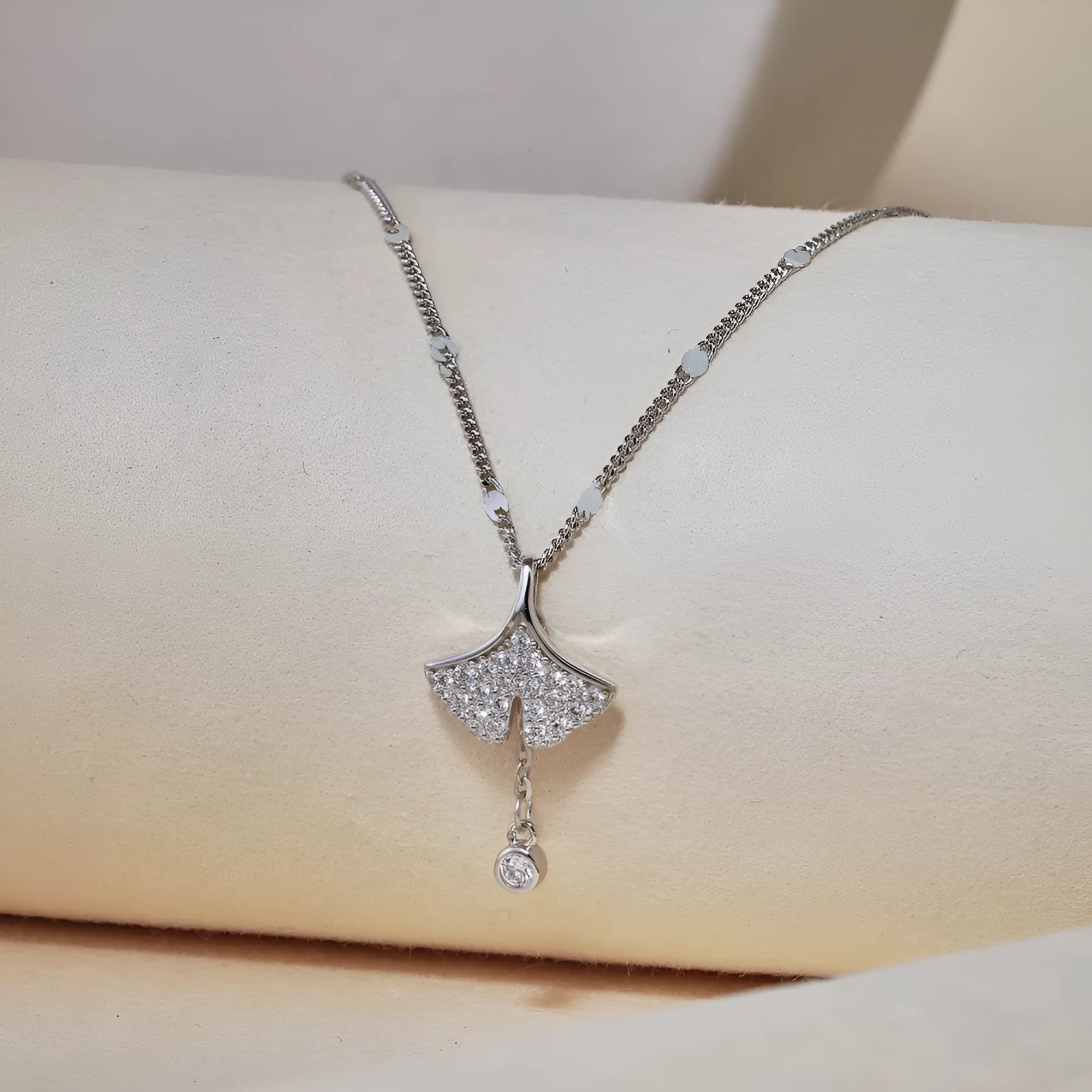 S925 sterling silver necklace with ginkgo leaf pendant in gold finish on curbs chain for women