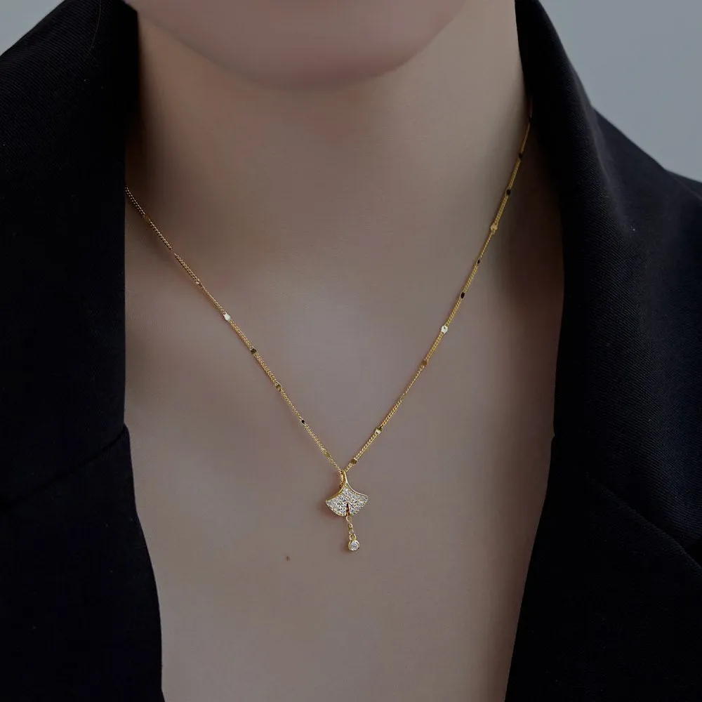 S925 sterling silver necklace with ginkgo leaf pendant in gold finish on curbs chain for women
