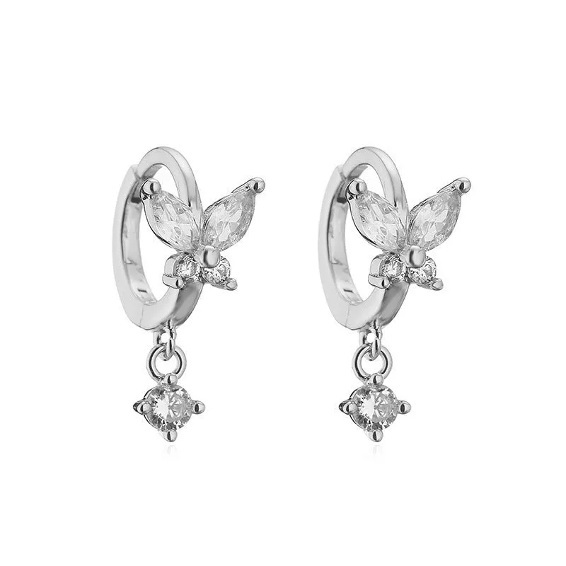 Copper earrings with inlaid colour diamond butterfly fringe design on white background