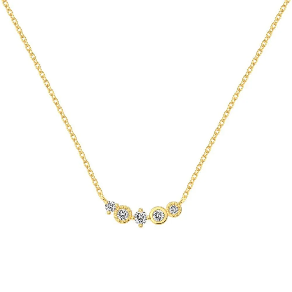 Geometric zircon pendant necklace in 925 silver with gold electroplate finish on display