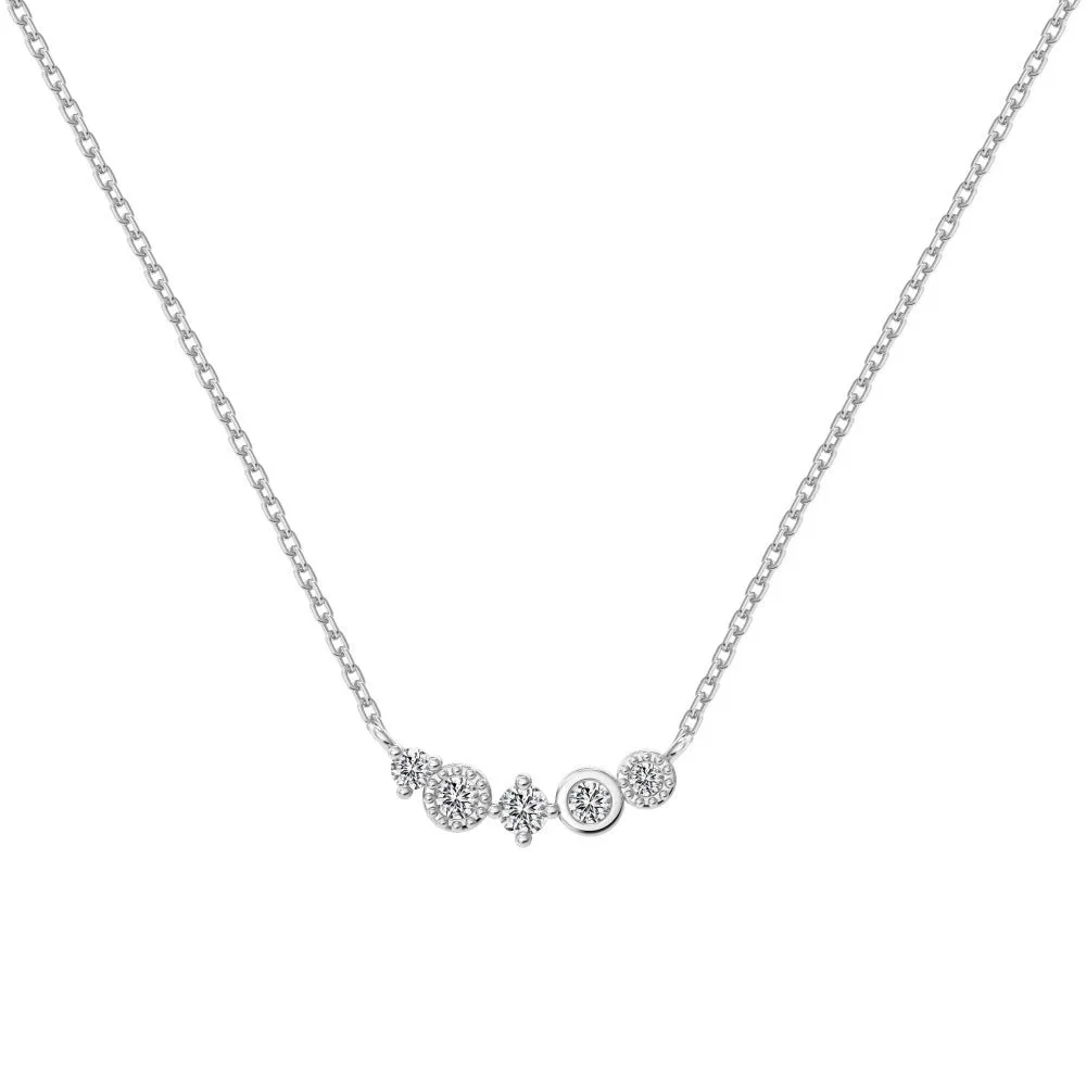 Geometric zircon pendant necklace in 925 silver with gold electroplate finish on display