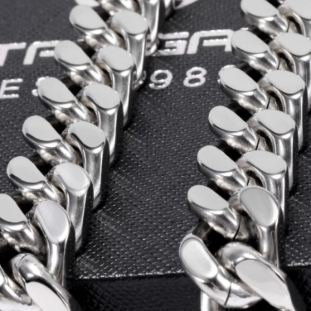Polished titanium steel Cuban link choker chain necklace in 12mm width on black background