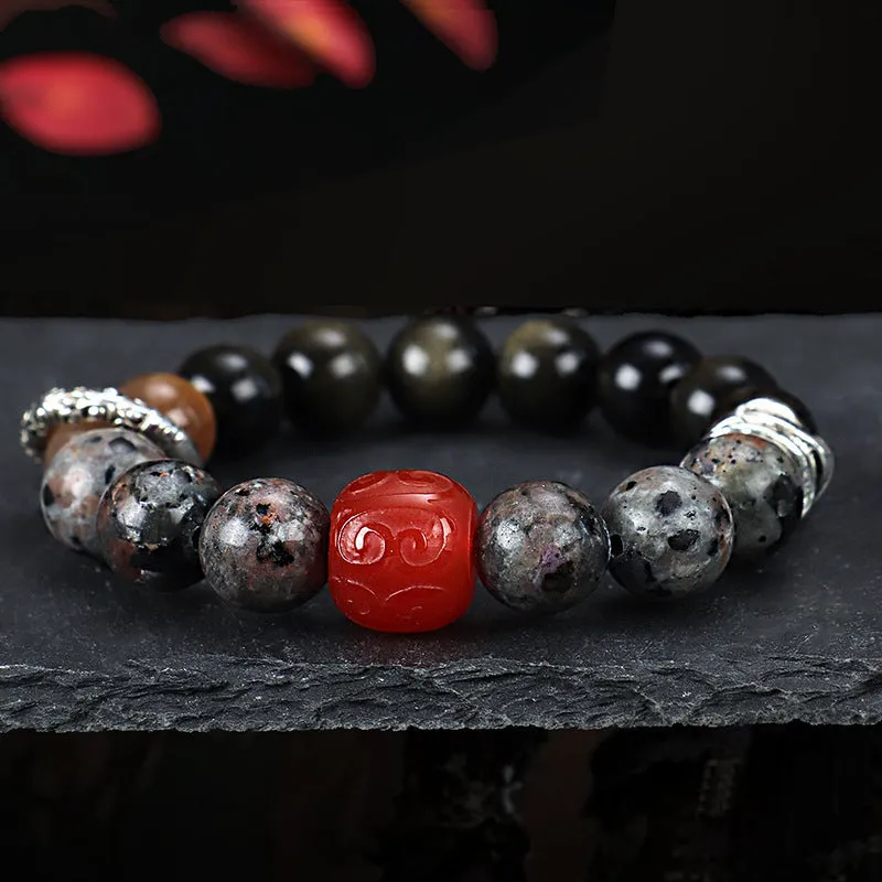 Handcrafted gold obsidian and red agate stone bracelet with Wukong pattern design
