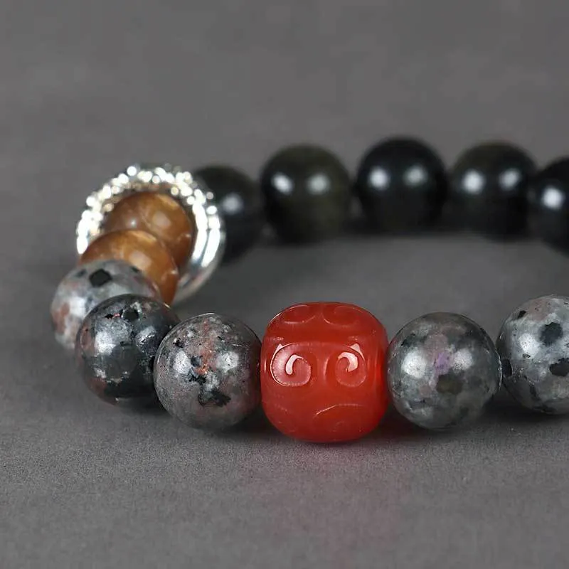 Handcrafted gold obsidian and red agate stone bracelet with Wukong pattern design