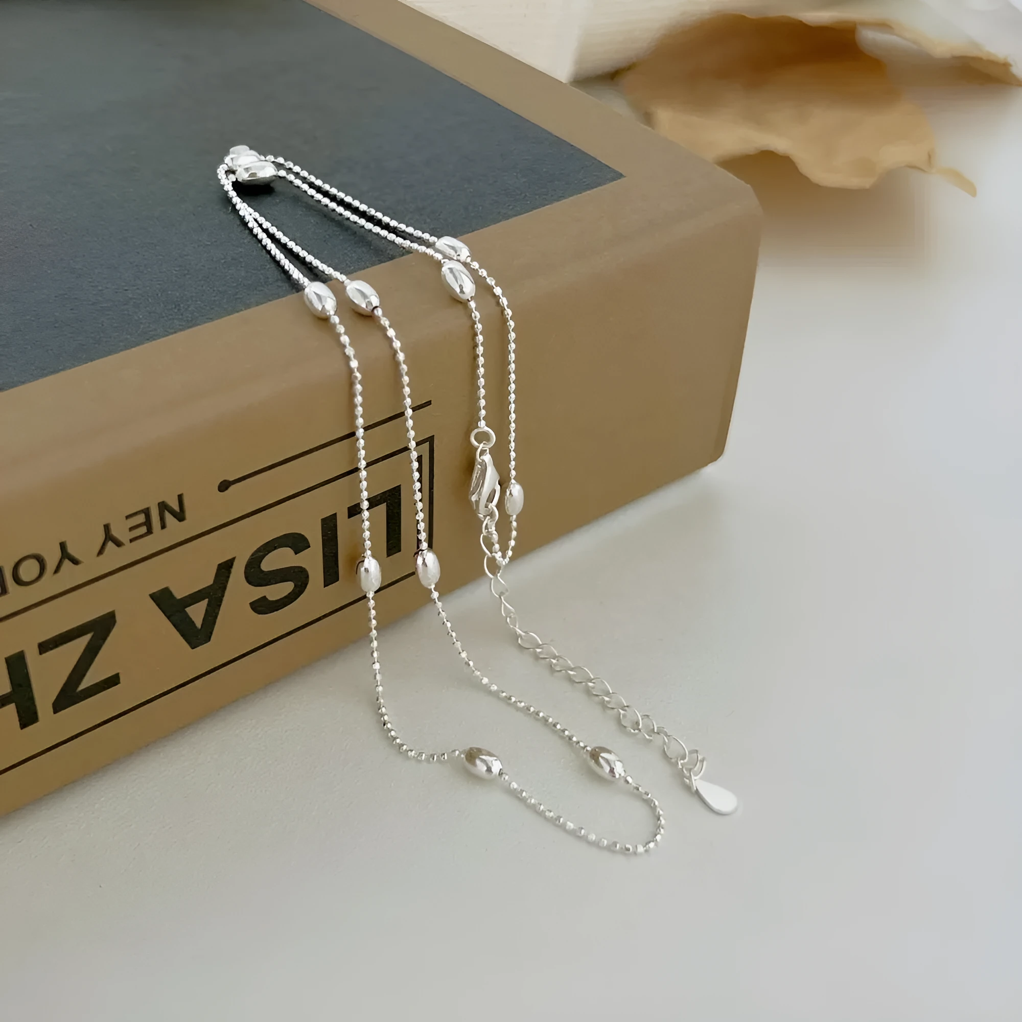 925 silver oval bead clavicle chain necklace with electroplated finish in silver colour