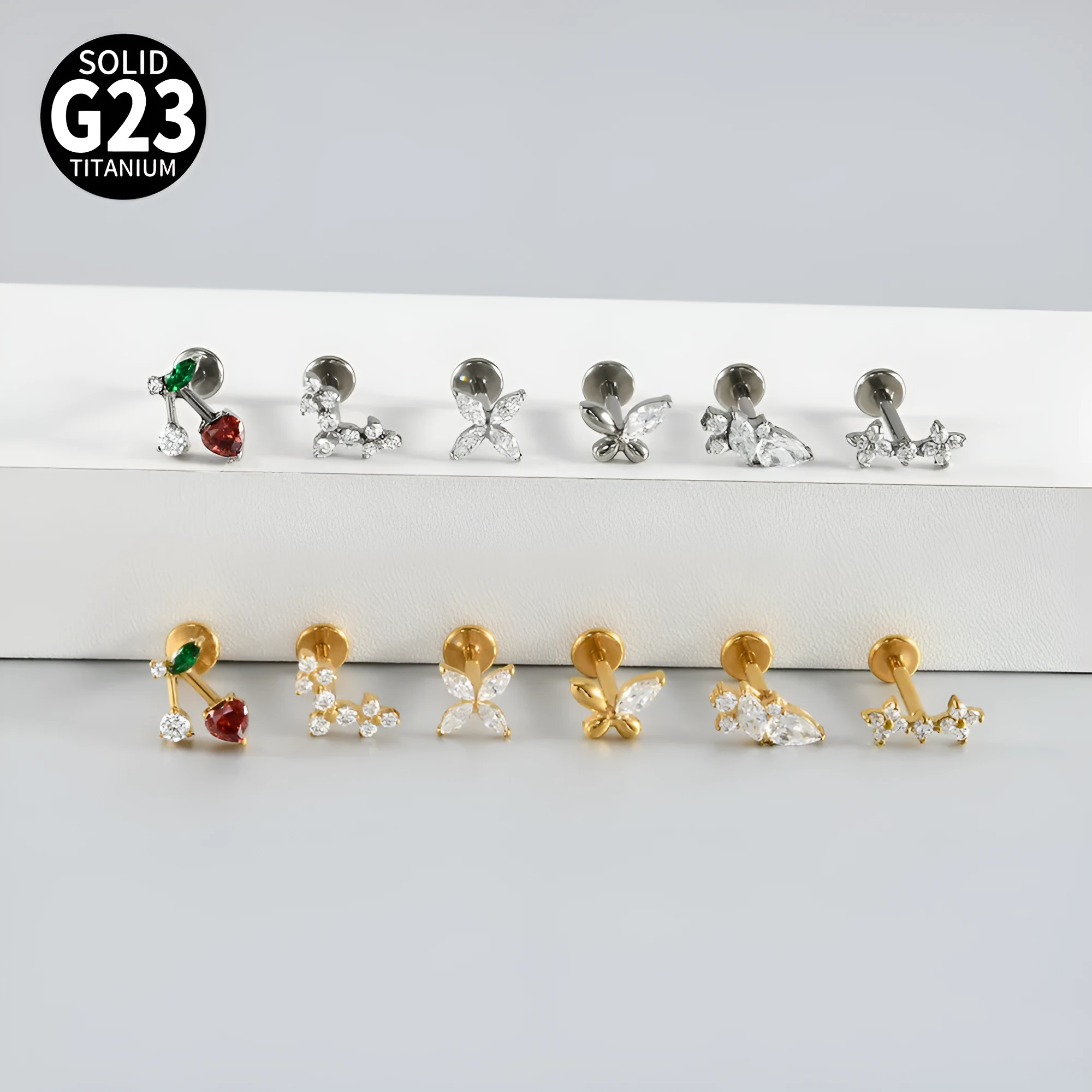 G23 titanium stud earrings with cherry zircon butterfly flower design, 1.2x8mm, gold electroplated finish