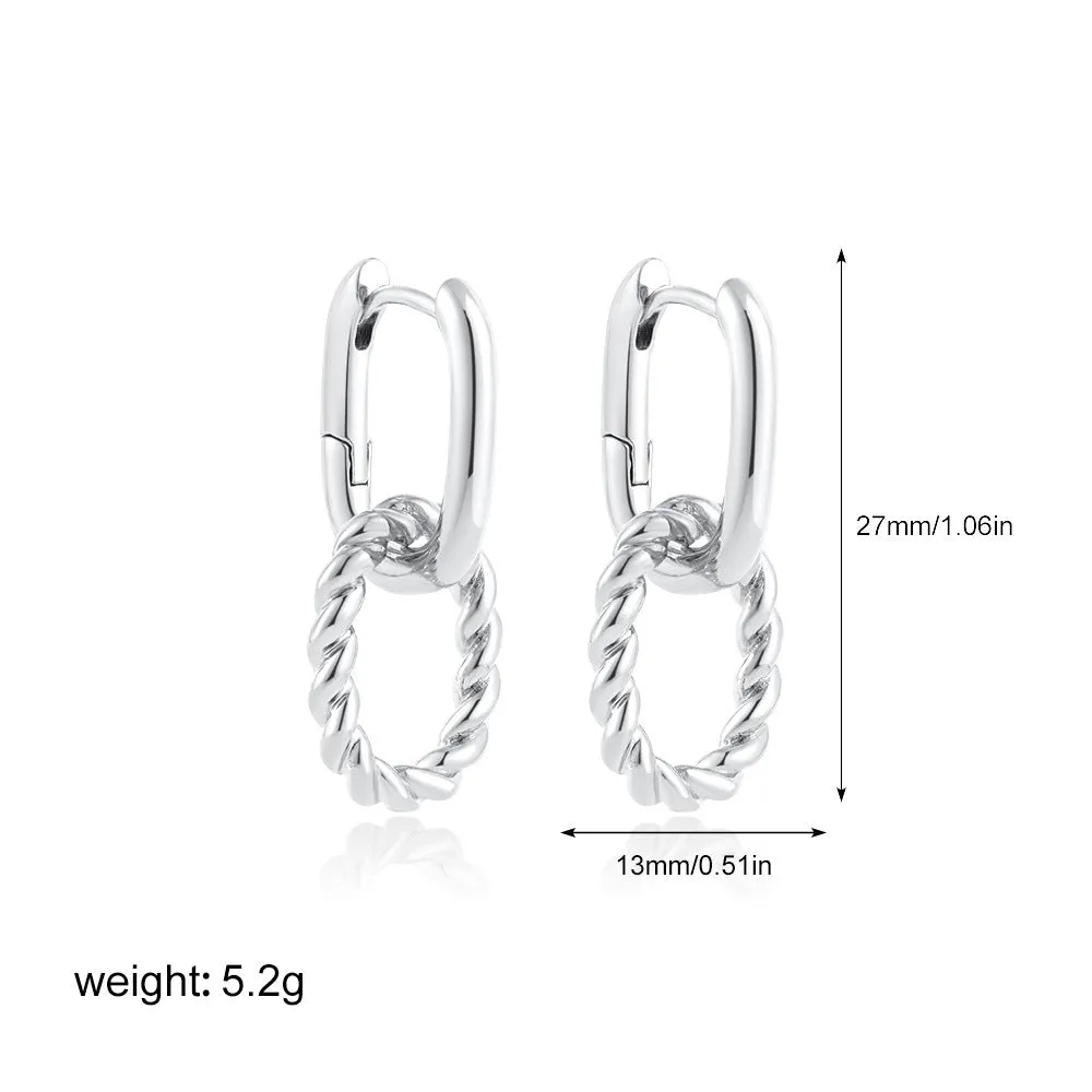 Double ring twist geometric square ear clip simple copper earrings on a neutral background