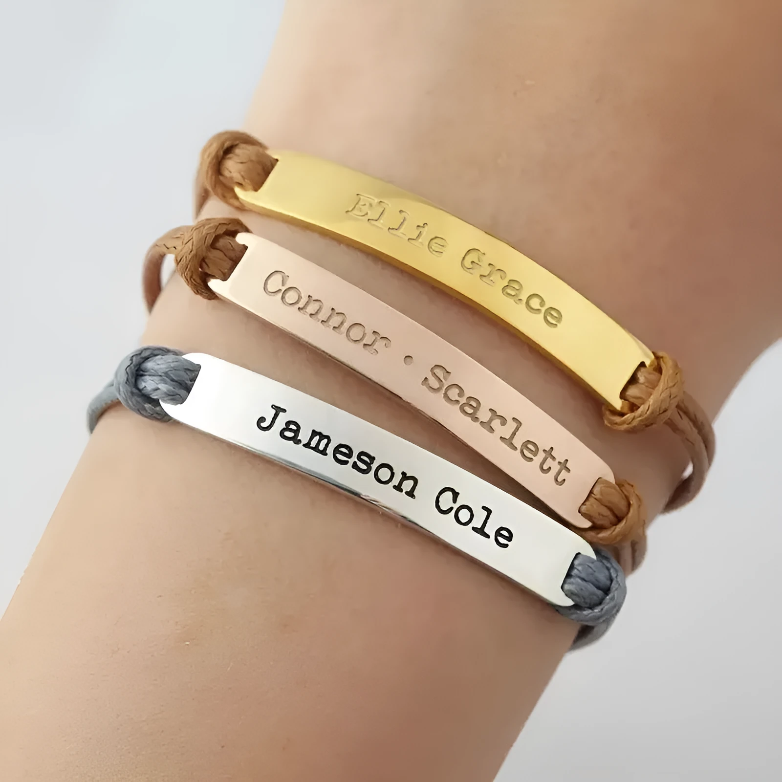 Stainless steel curved inspirational engraved woven stretch wristband in rose gold finish with synthetic leather band