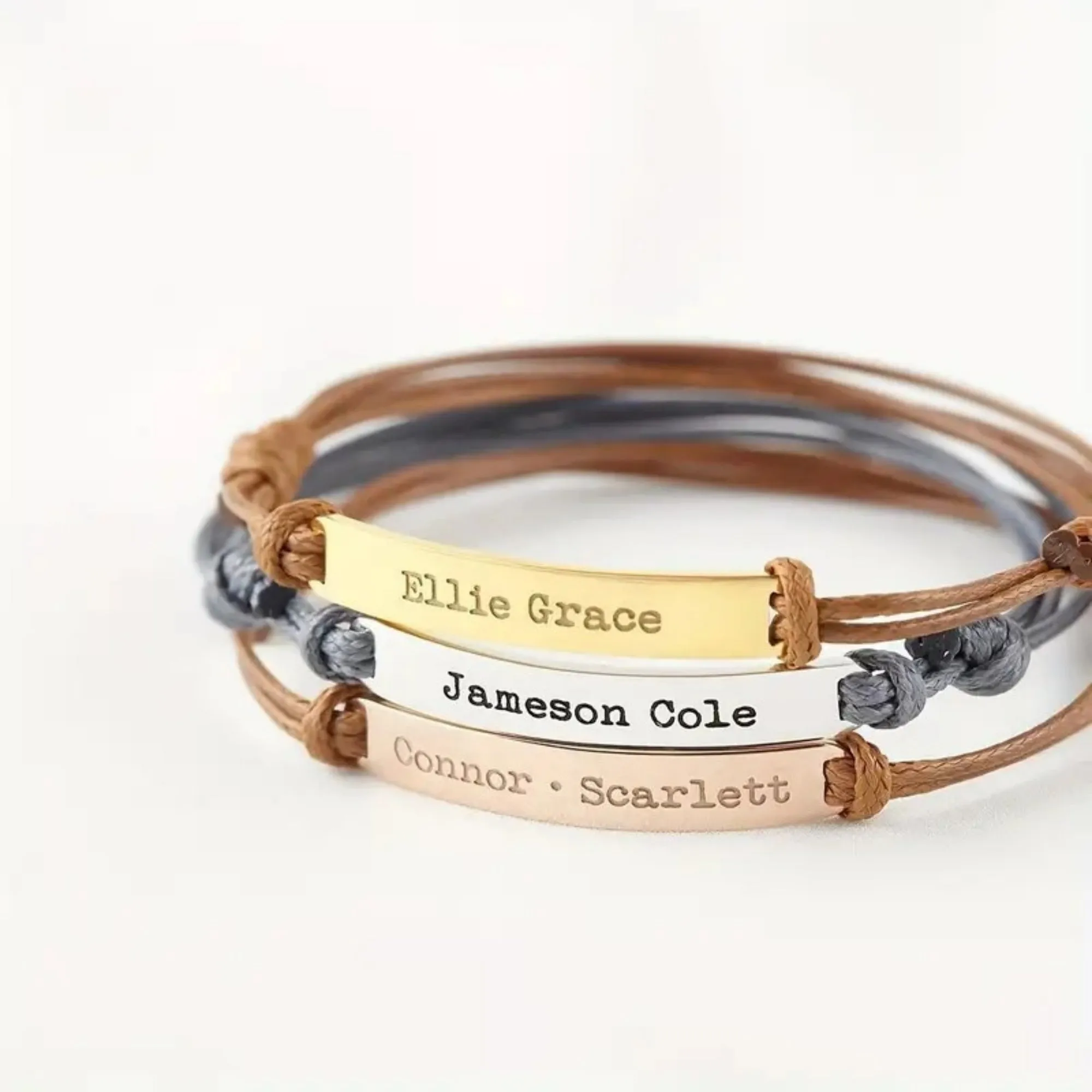 Stainless steel curved inspirational engraved woven stretch wristband in rose gold finish with synthetic leather band