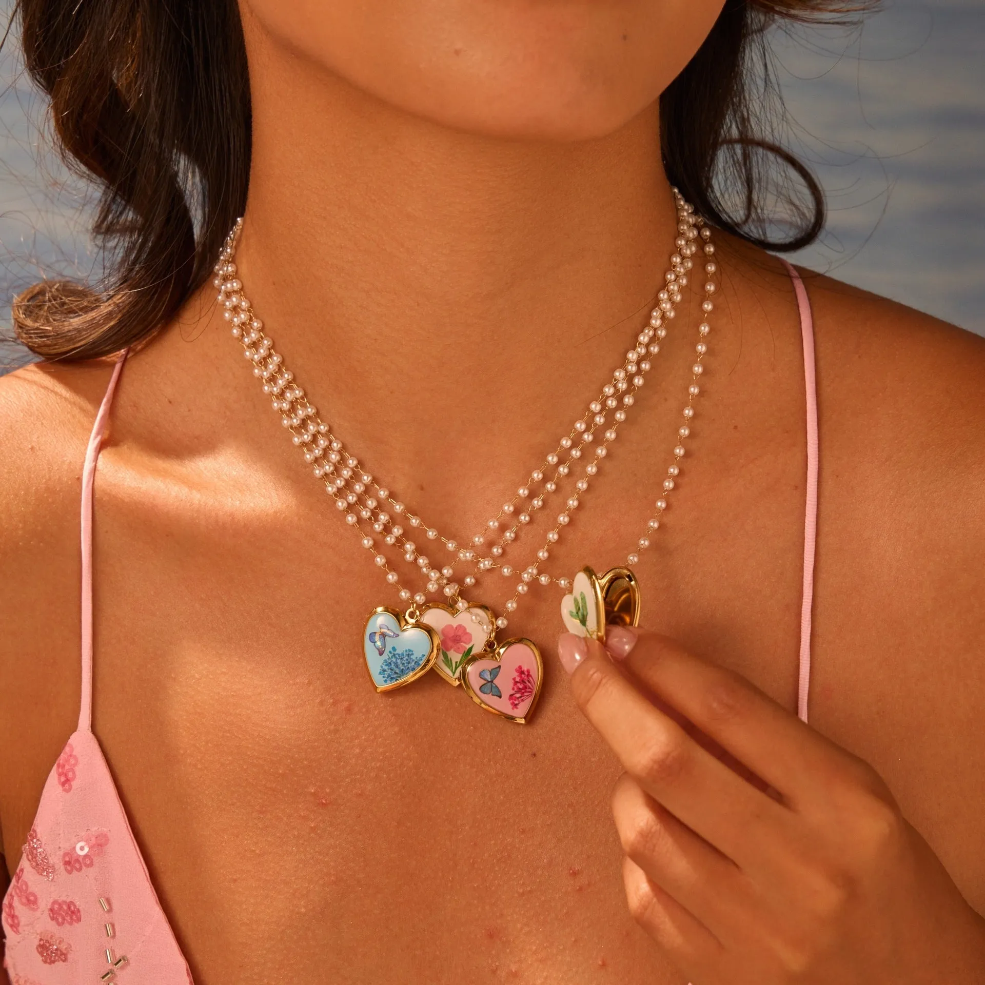 18K gold electroplated stainless steel love photo box necklace on display, geometric pendant, four colour options available