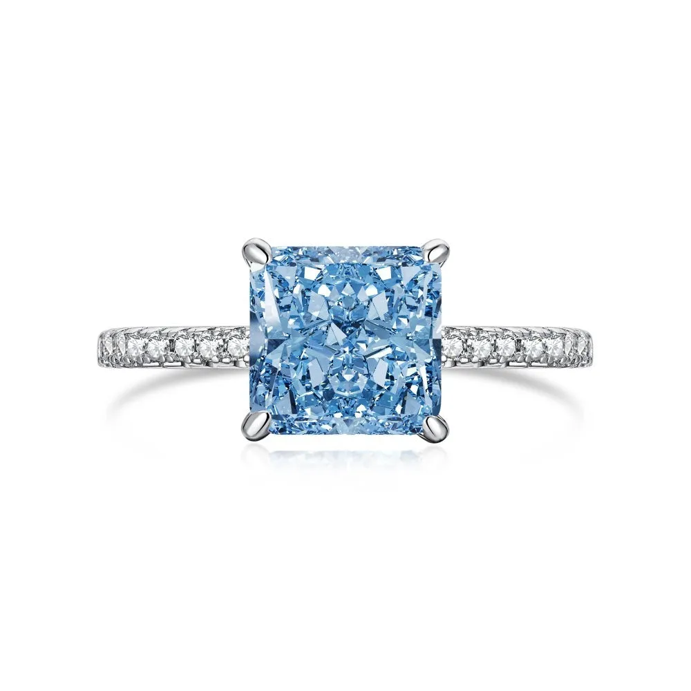 Sterling silver geometric cube sugar ring with ice flower cut cubic zirconia on silver background