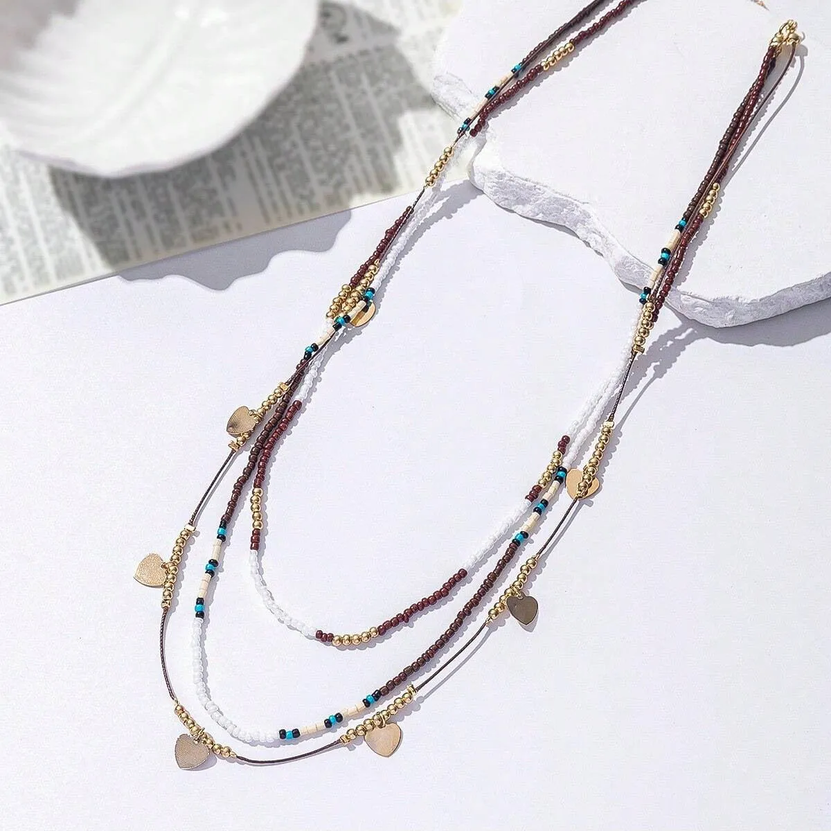 Multi-layer bead necklace with alloy geometric pendant in ethnic style, unisex clavicle chain