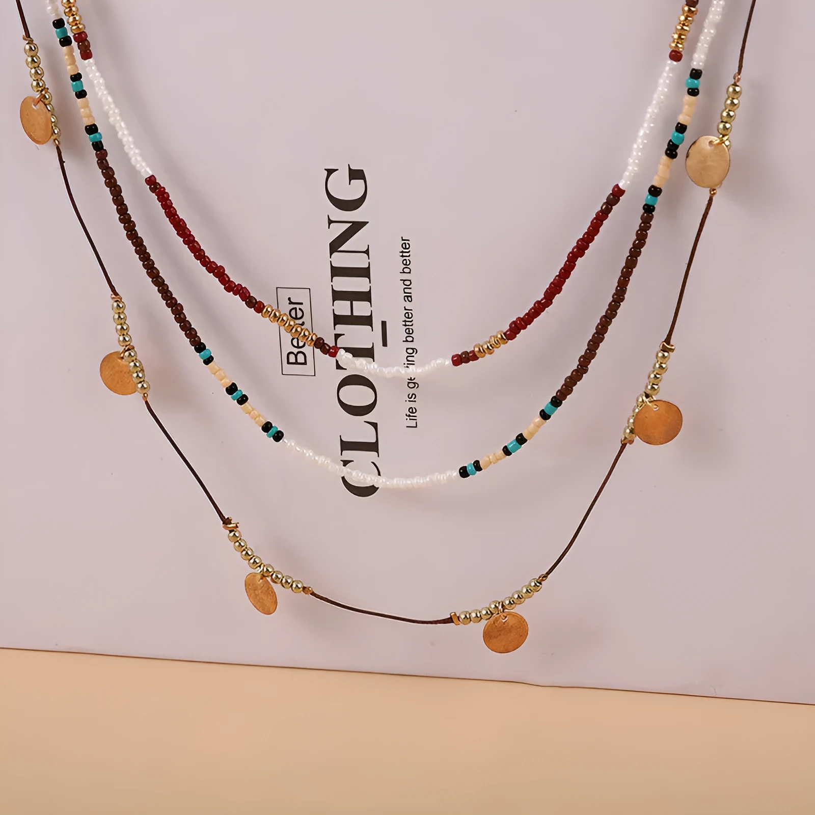 Multi-layer bead necklace with alloy geometric pendant in ethnic style, unisex clavicle chain