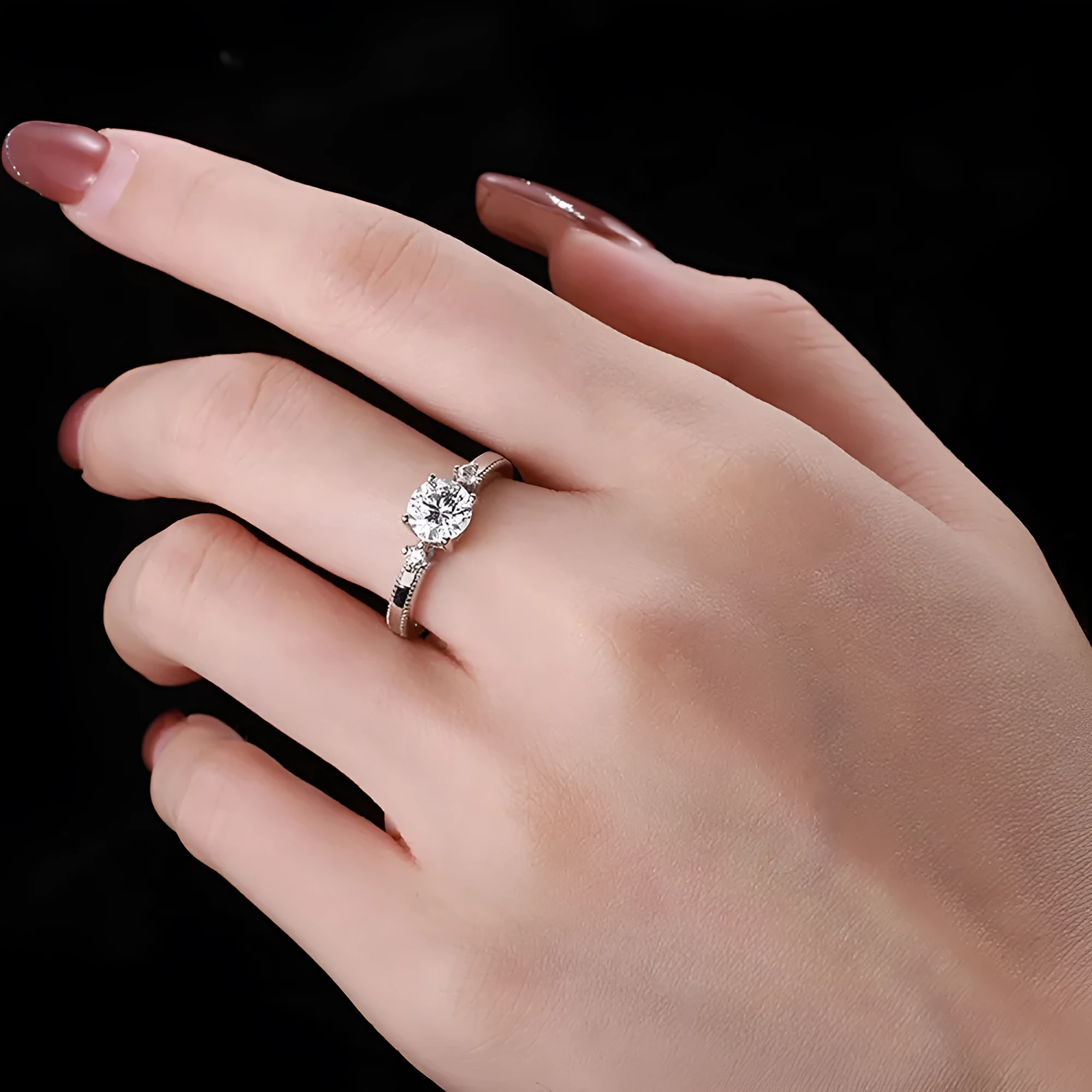 Women's classic four-claw silver ring with electroplated finish in AY120209 colour, shown on a neutral background.