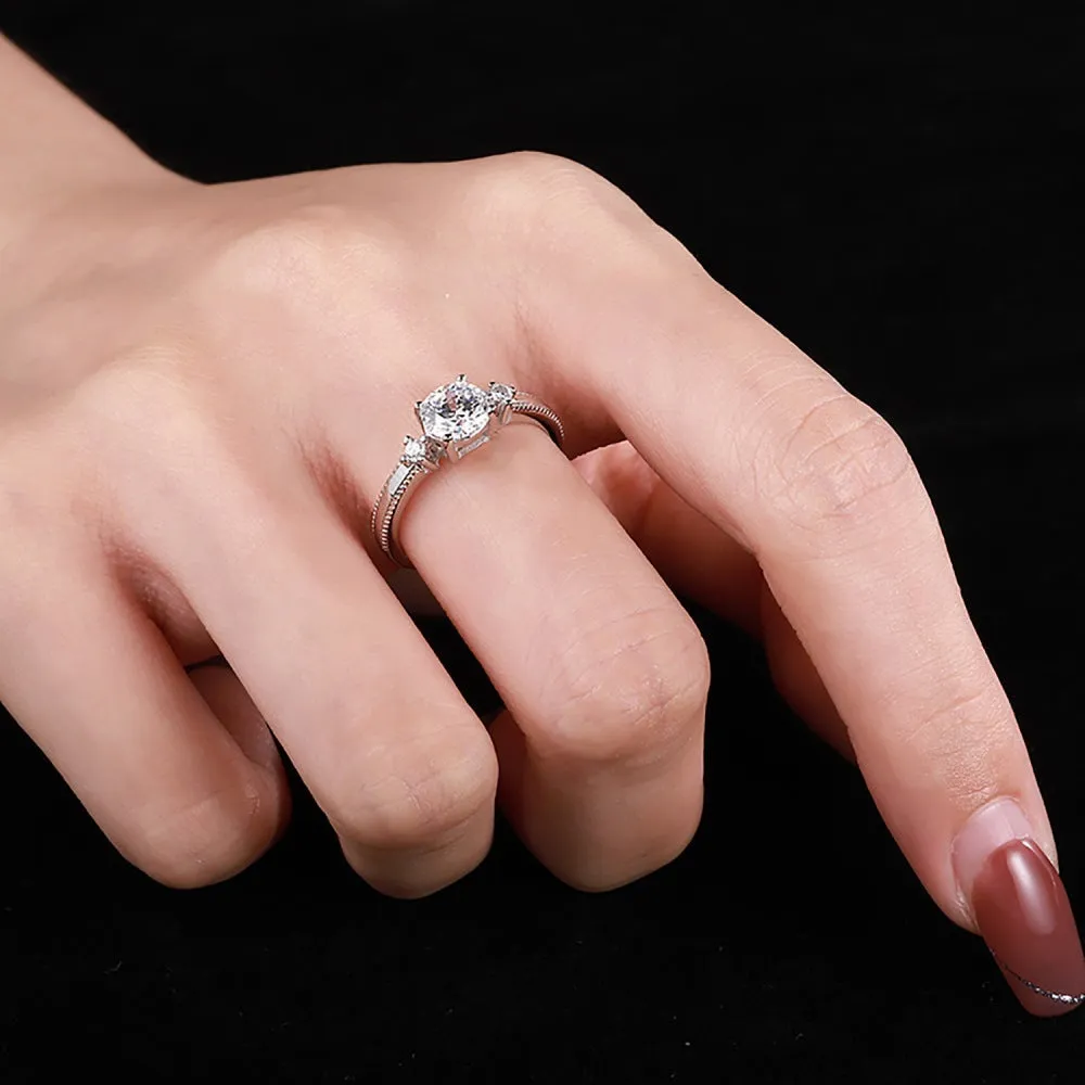 Women's classic four-claw silver ring with electroplated finish in AY120209 colour, shown on a neutral background.