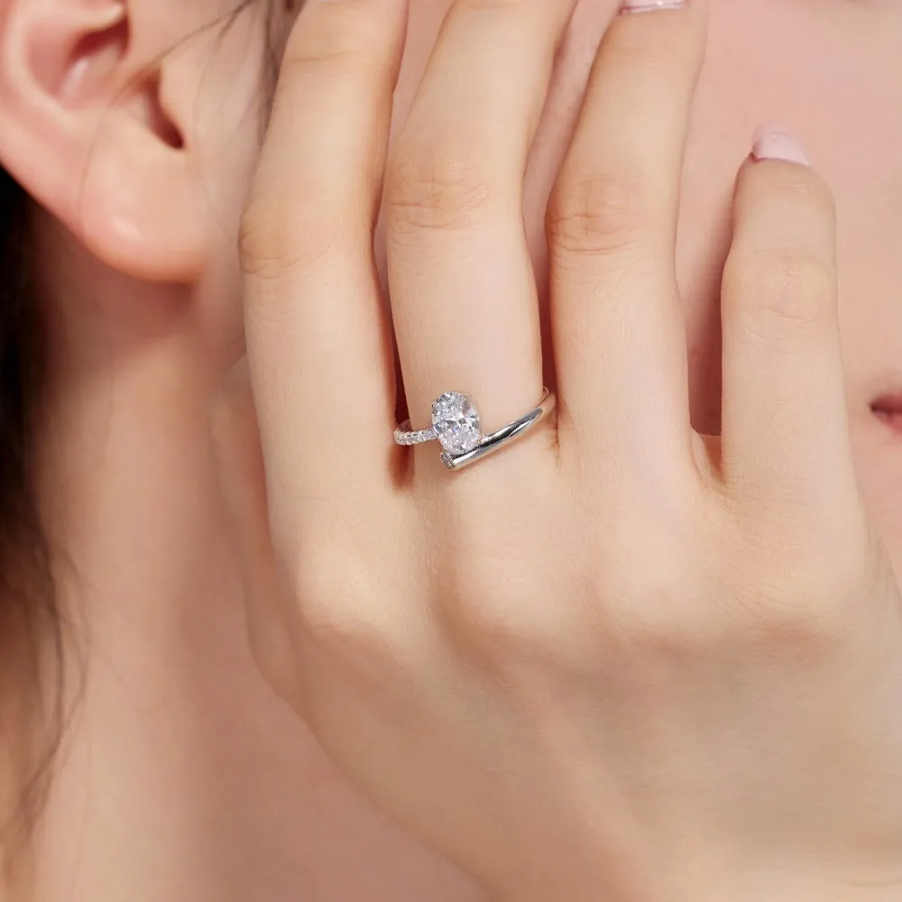 S925 sterling silver ring with oval zircon star track design on white background