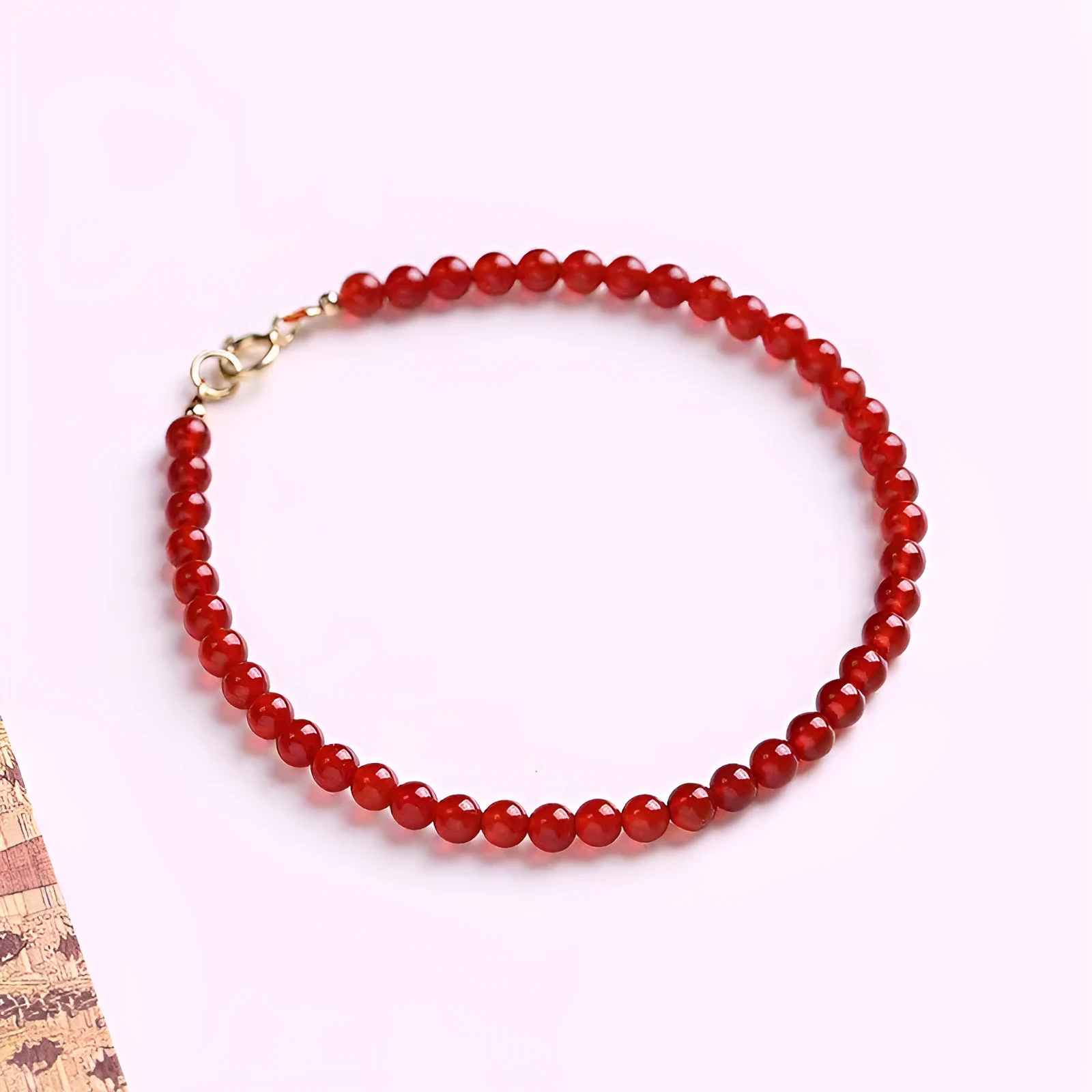 Ultra-thin red agate bracelet for women showing classic style and calm small profile