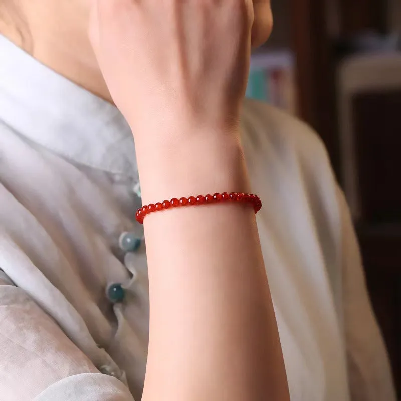 Ultra-thin red agate bracelet for women showing classic style and calm small profile