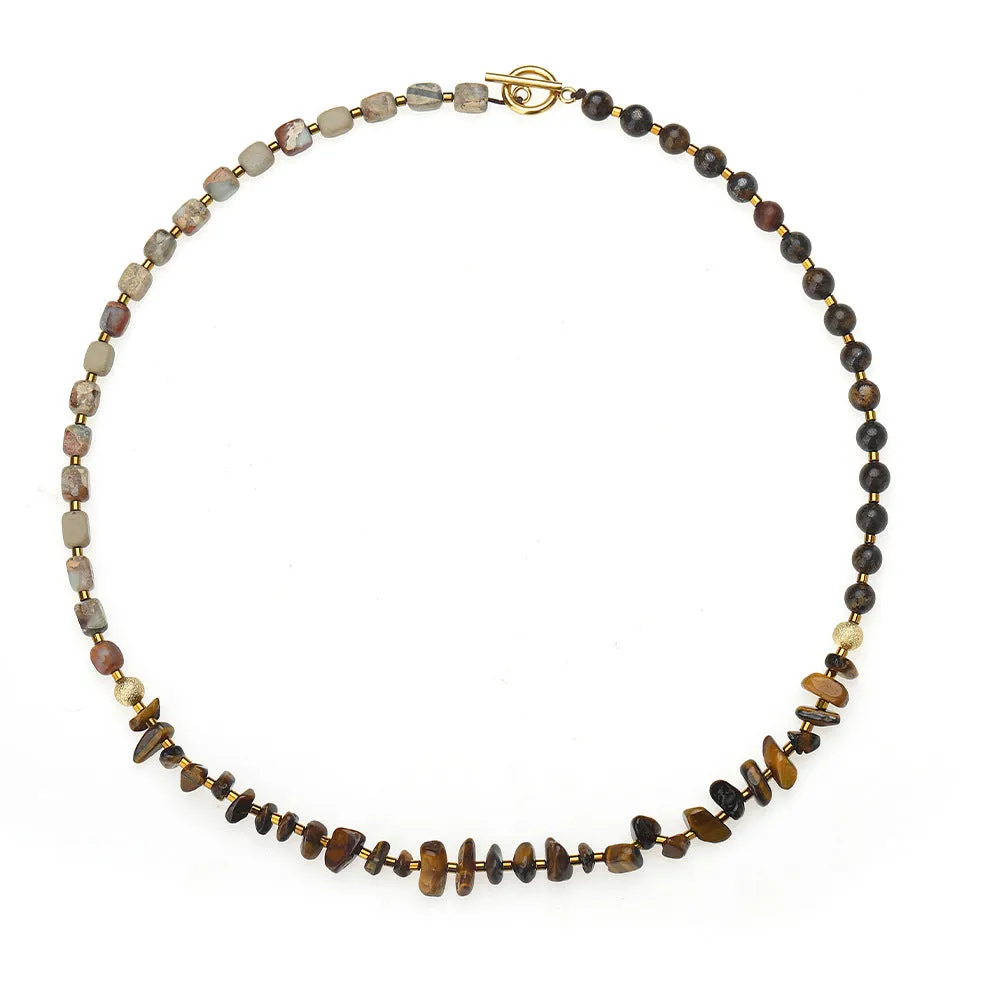 Tigereye stone and bronze geometric bracelet with glow ball design and texture details
