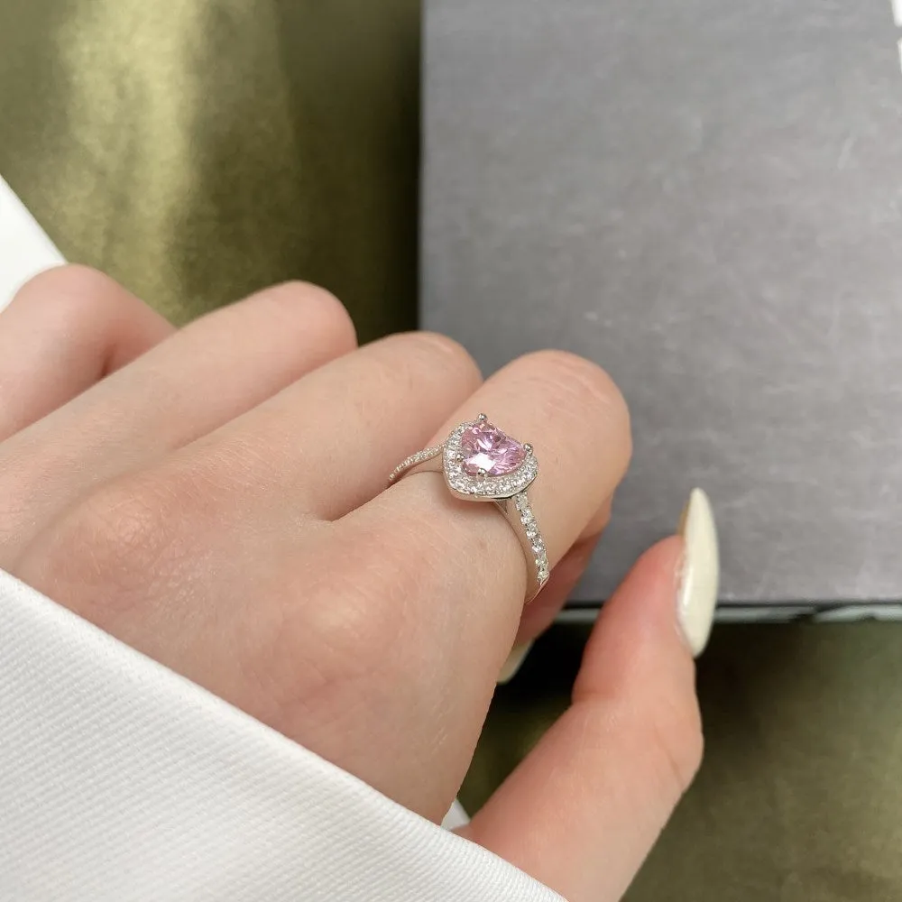 Women's S925 sterling silver heart-shaped ring in white diamond electroplated finish on white background
