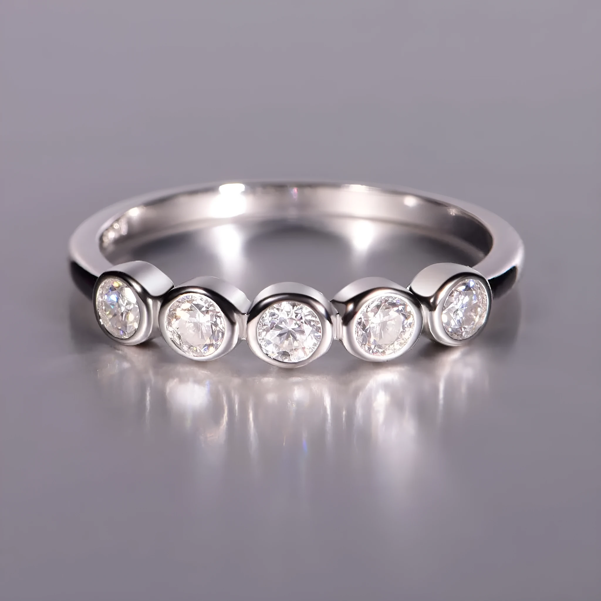 925 silver round moissanite ring with white gold electroplated finish on a geometric band, available in sizes 5 to 9
