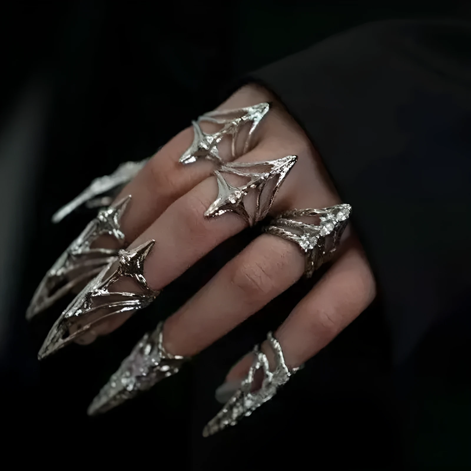 Metal ring with micro inlaid zircon and butterfly geometric design, INS style, on a white background