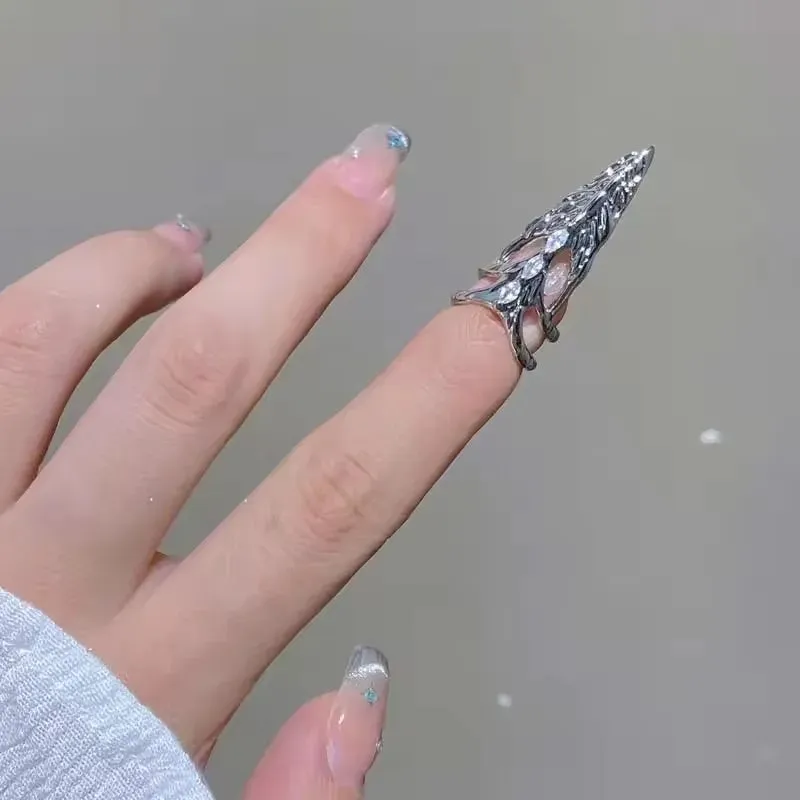 Metal ring with micro inlaid zircon and butterfly geometric design, INS style, on a white background