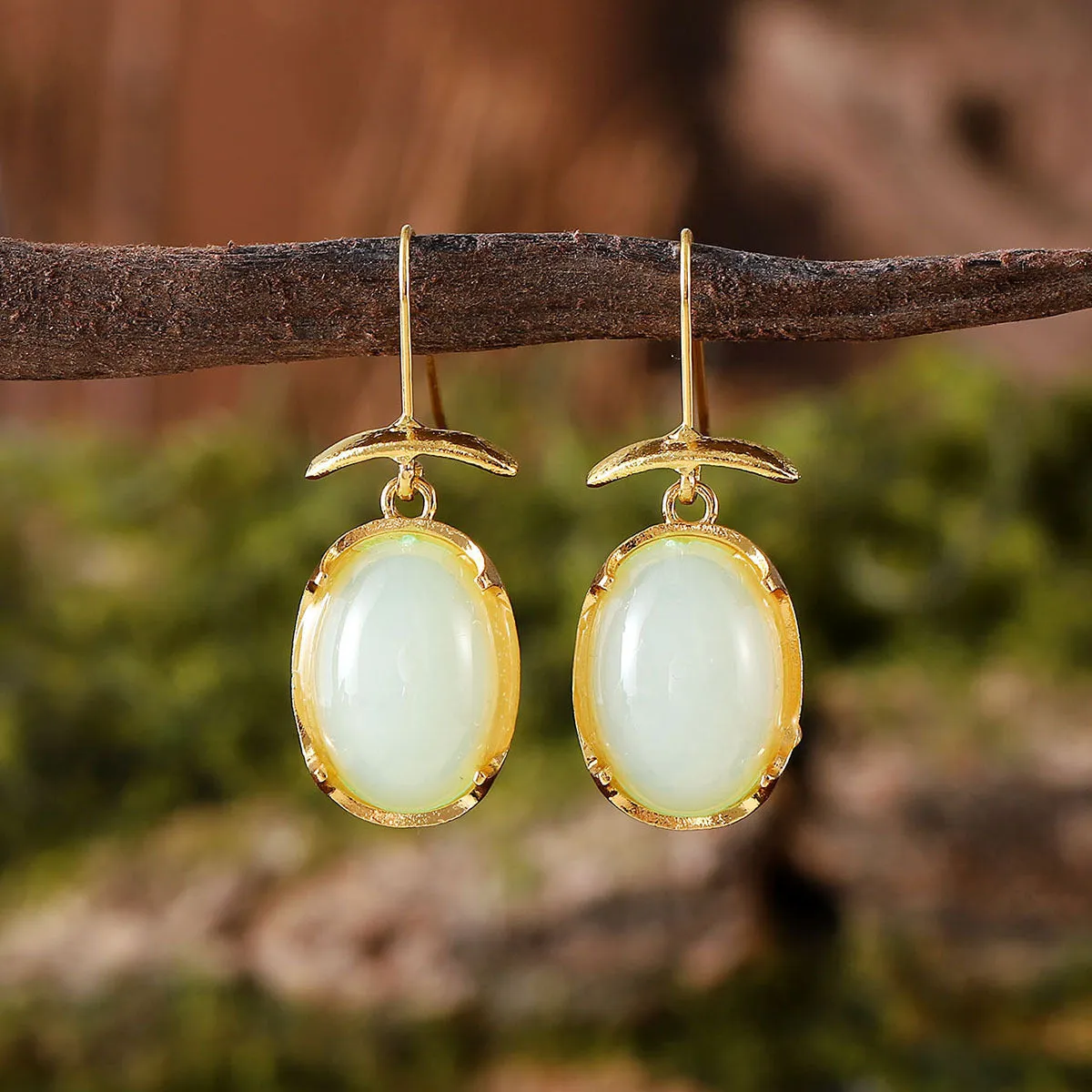 Zinc alloy geometric pendant earrings for women in ruby, sapphire, turquoise, and white gemstone colours