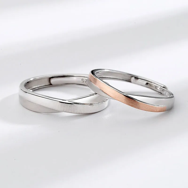 S925 sterling silver Mobius strip interwoven double knot adjustable couple ring on finger showing geometric infinity design
