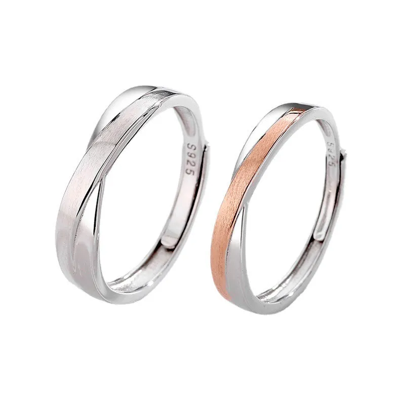 S925 sterling silver Mobius strip interwoven double knot adjustable couple ring on finger showing geometric infinity design
