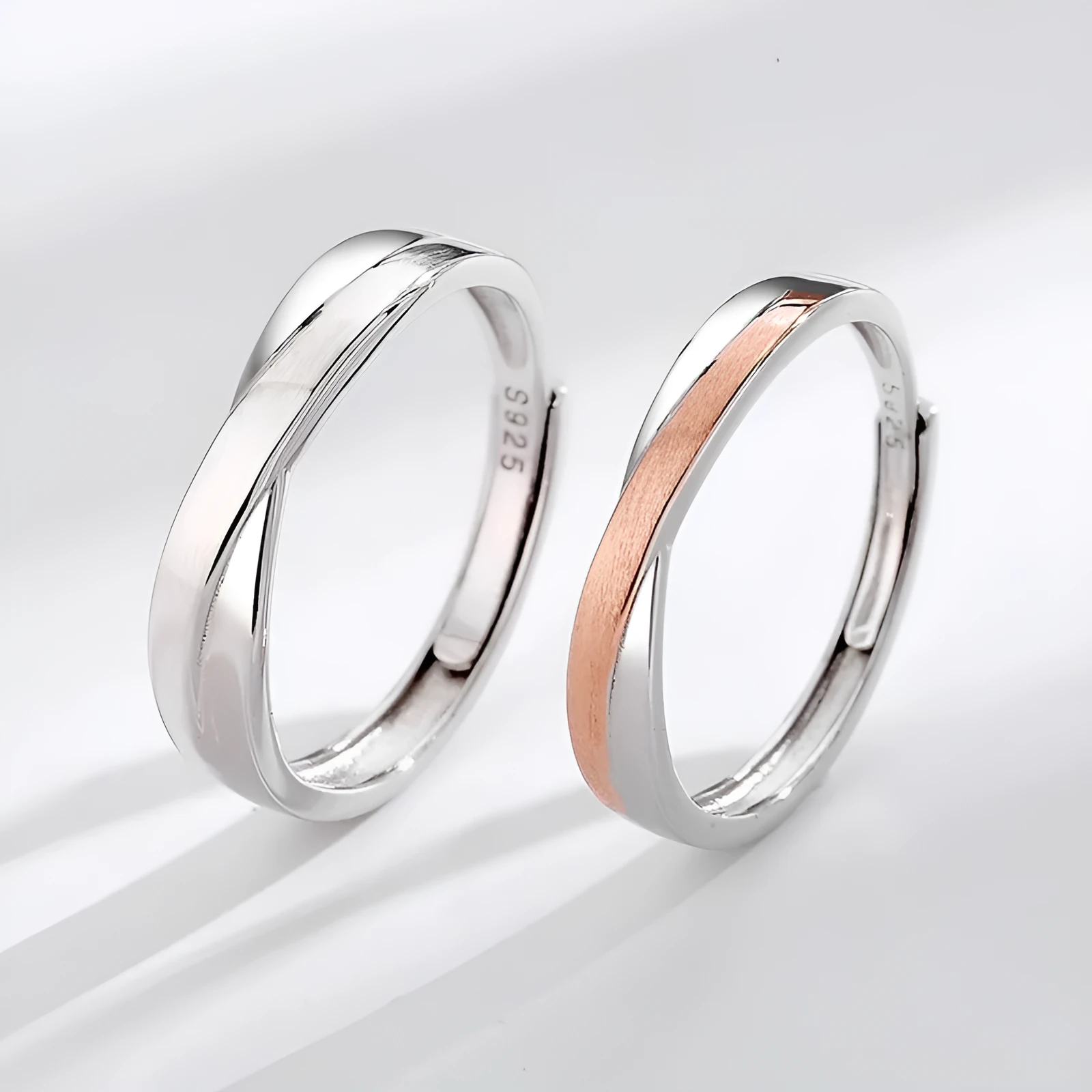 S925 sterling silver Mobius strip interwoven double knot adjustable couple ring on finger showing geometric infinity design